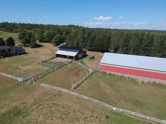 birds eye view of property featuring a rural view