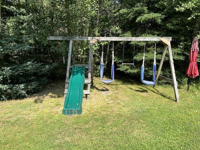 view of jungle gym featuring a yard