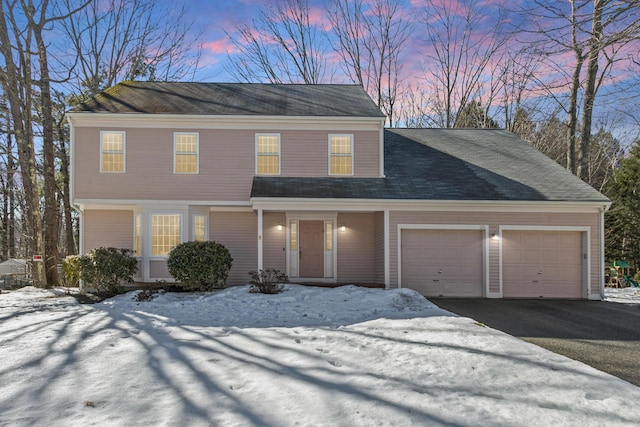 view of front of property with an attached garage and driveway