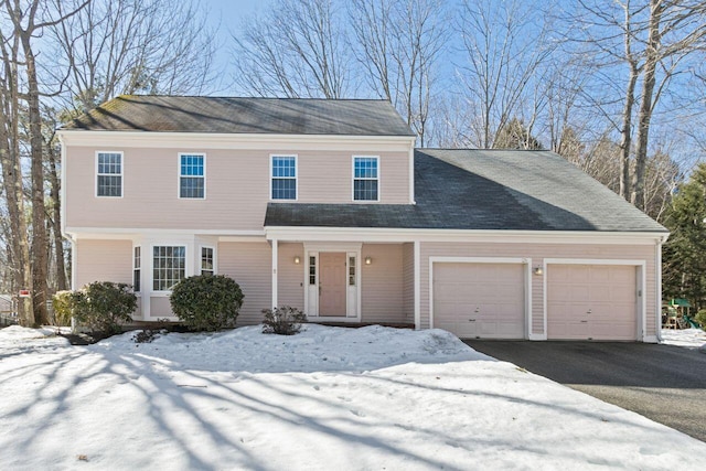 view of front facade featuring a garage and driveway