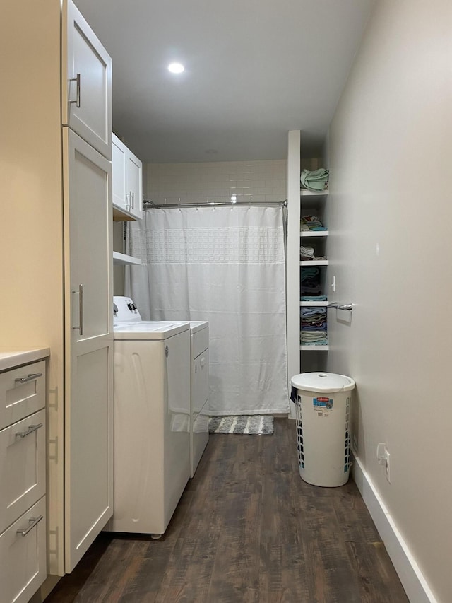 laundry room featuring dark hardwood / wood-style floors and independent washer and dryer
