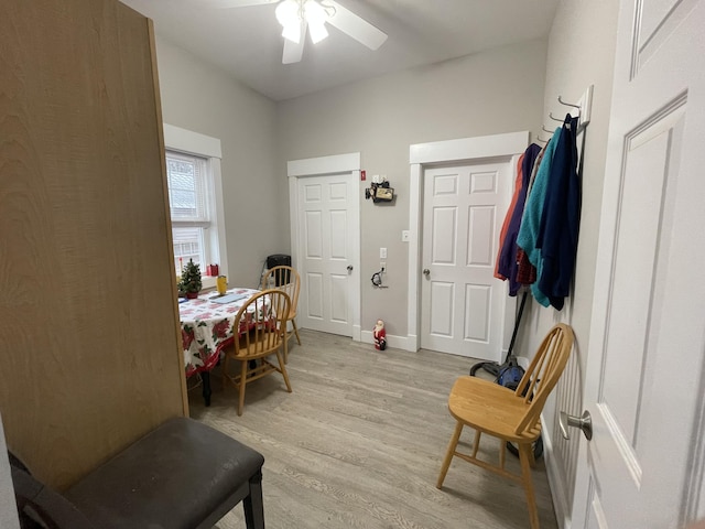 interior space with ceiling fan and light hardwood / wood-style floors