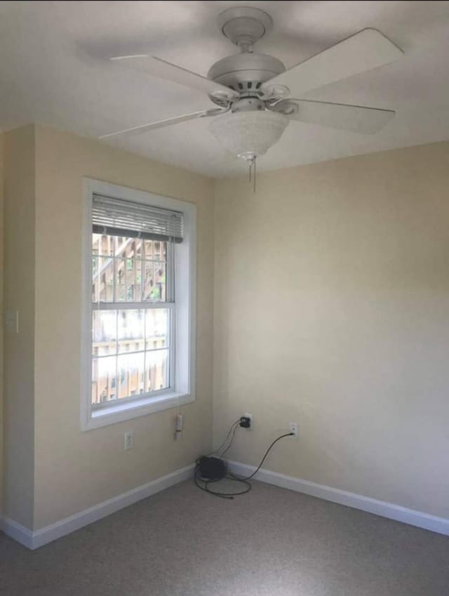 spare room featuring ceiling fan