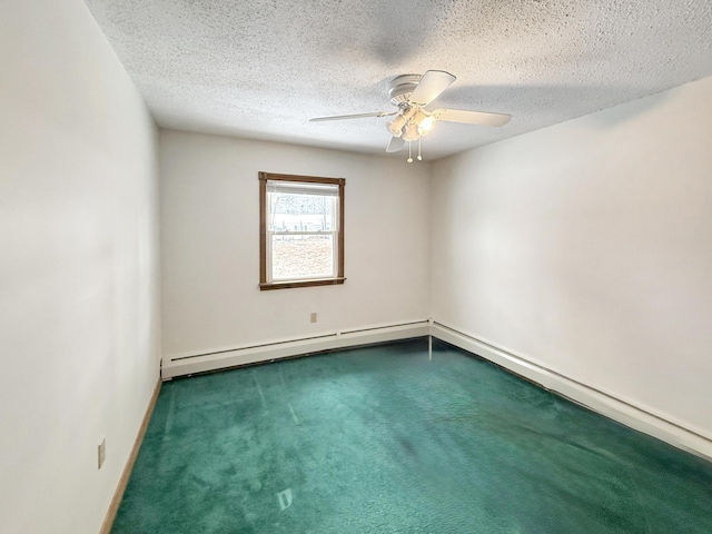 carpeted spare room featuring baseboard heating, a textured ceiling, and ceiling fan