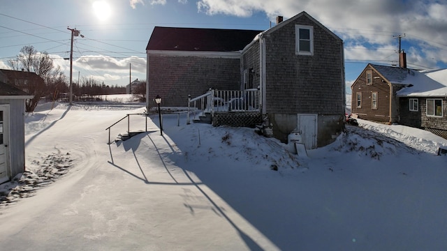 view of snow covered property