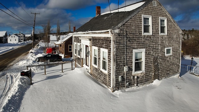 view of snow covered property