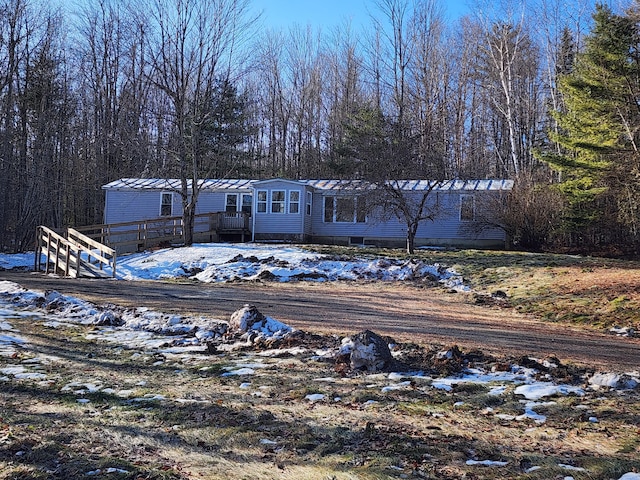 view of front of property featuring a deck