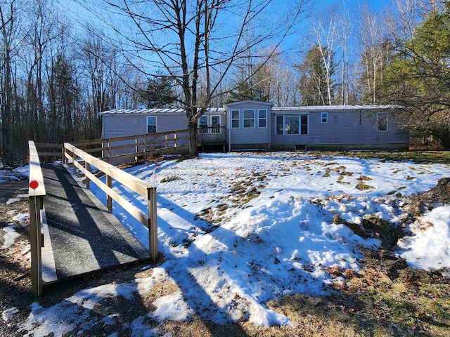 exterior space featuring a wooden deck