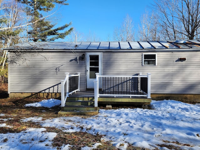 view of snow covered property