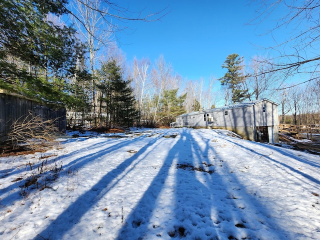 view of yard covered in snow