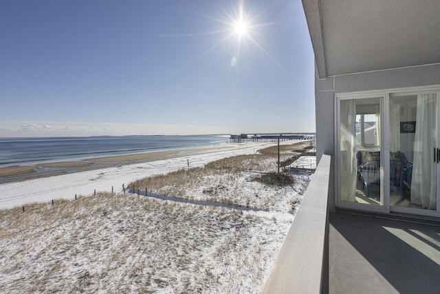 property view of water featuring a beach view