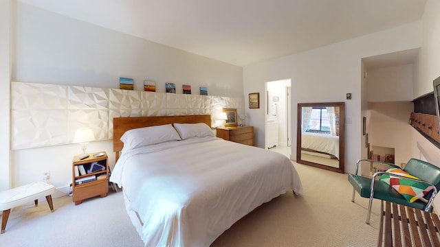 bedroom featuring light colored carpet