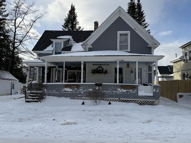 view of front of property featuring covered porch