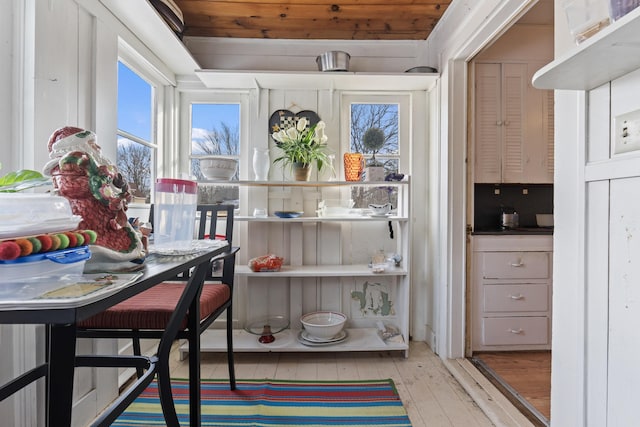 dining area featuring light wood-type flooring