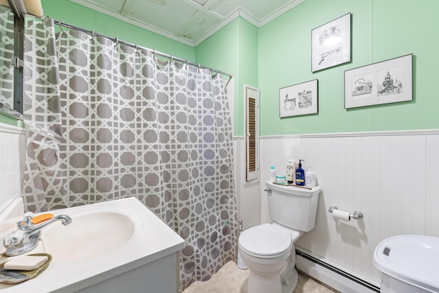 bathroom featuring a baseboard heating unit, vanity, ornamental molding, a shower with curtain, and toilet