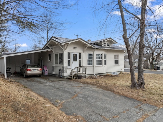 view of front of house featuring a carport