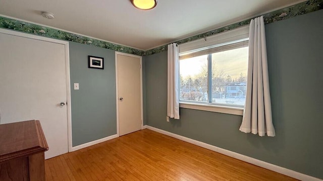 empty room featuring hardwood / wood-style floors