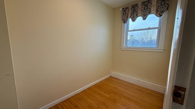 spare room featuring light hardwood / wood-style floors