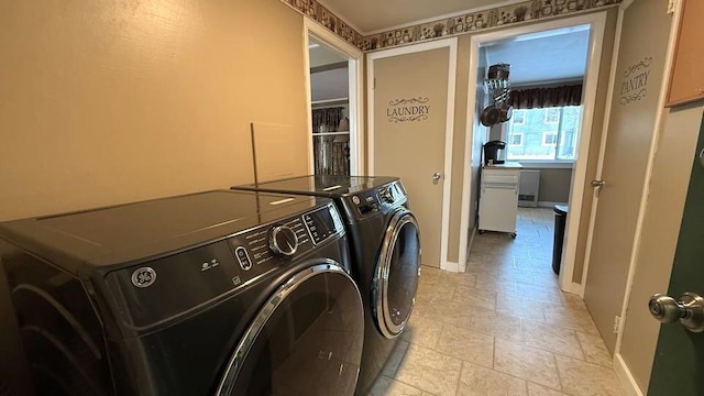 laundry area featuring washer and dryer