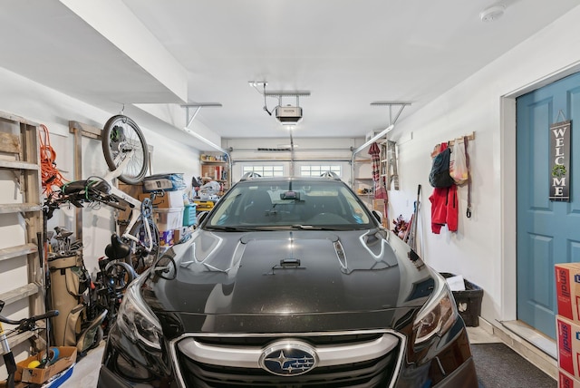 garage featuring a garage door opener