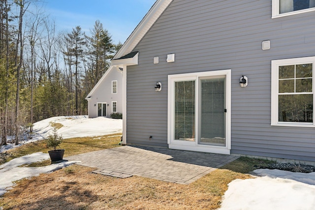 back of property featuring a patio