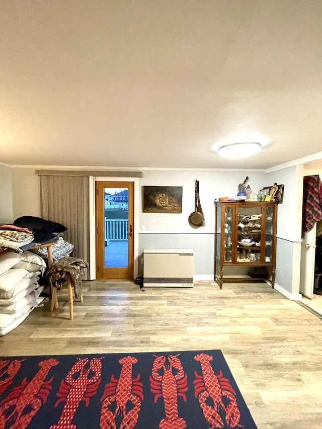 sitting room with hardwood / wood-style flooring