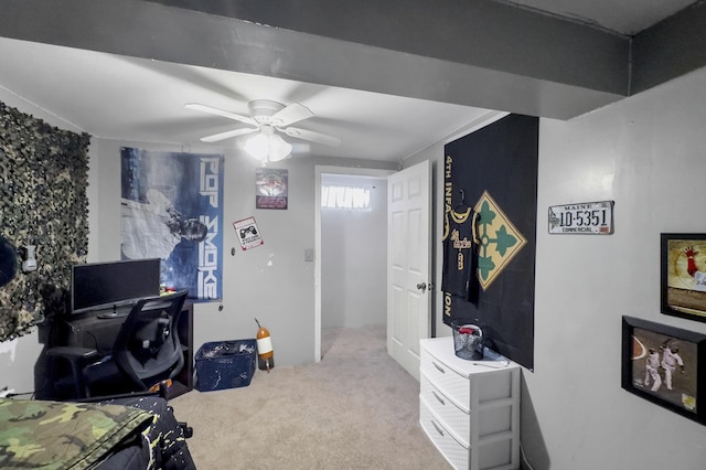 carpeted office with ceiling fan