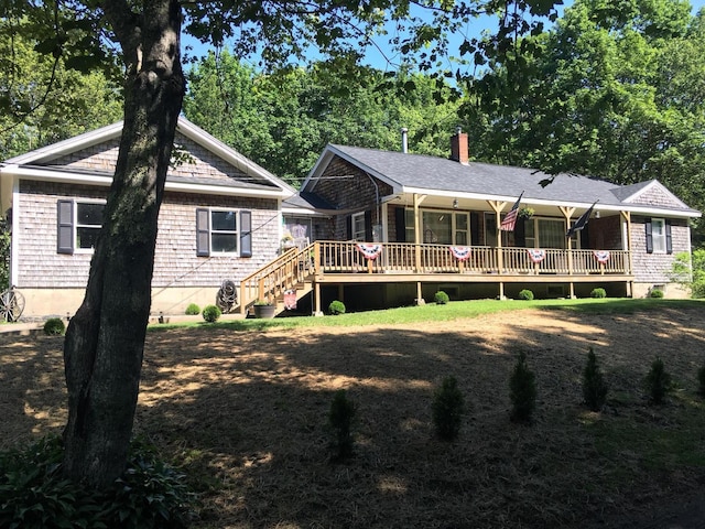 18 Trunnel Ln, Friendship, ME 04547 - back of house with a chimney and a wooden deck