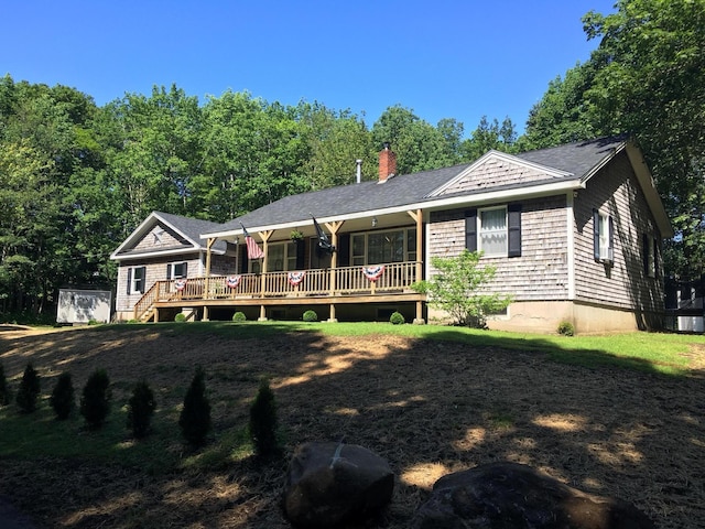 18 Trunnel Ln, Friendship, ME 04547 - single story home with a chimney and a deck