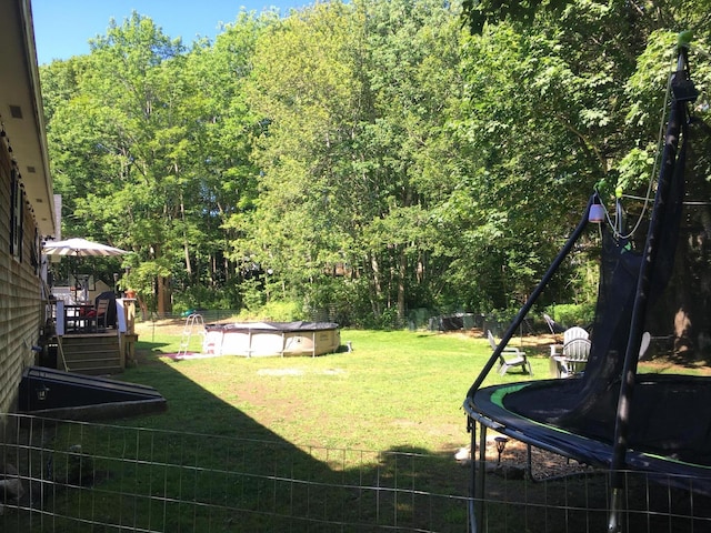 18 Trunnel Ln, Friendship, ME 04547 - view of grassy yard featuring a trampoline
