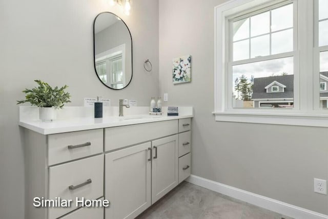 170 Buttonbush Ln Unit 21, Wells, ME 04090 - bathroom with baseboards and vanity
