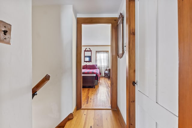 hall with light hardwood / wood-style flooring