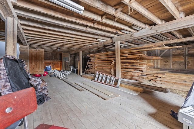 miscellaneous room featuring hardwood / wood-style flooring