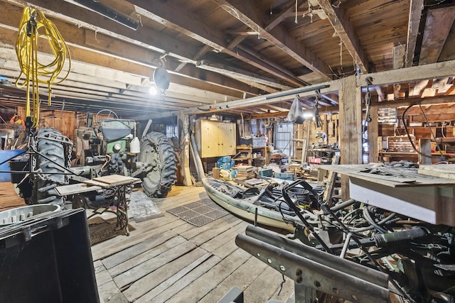 basement featuring wood-type flooring