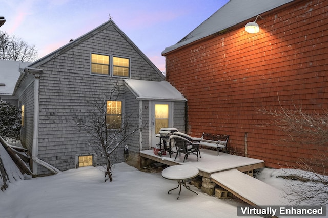 view of snow covered property