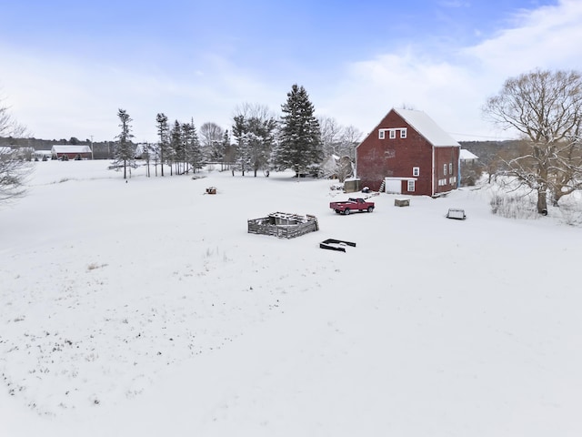 view of yard layered in snow