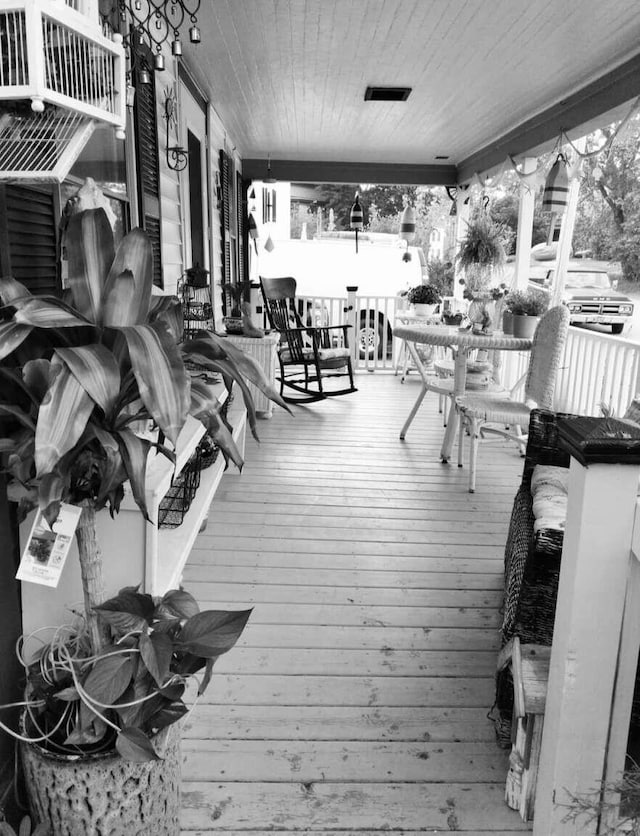 deck with covered porch