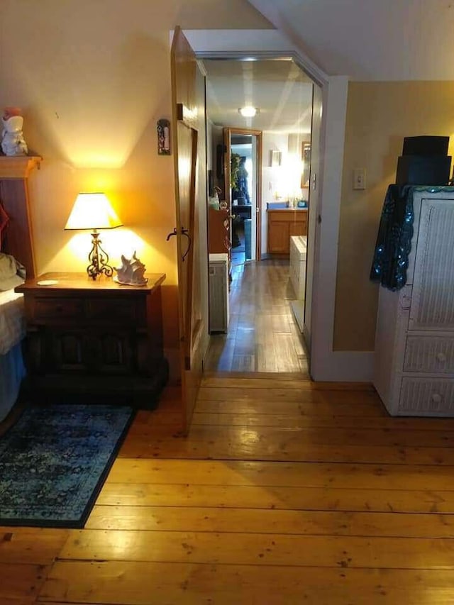 hallway featuring light wood finished floors