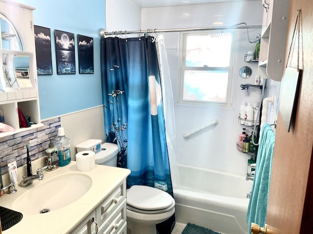 full bathroom with toilet, vanity, and shower / bath combination with curtain