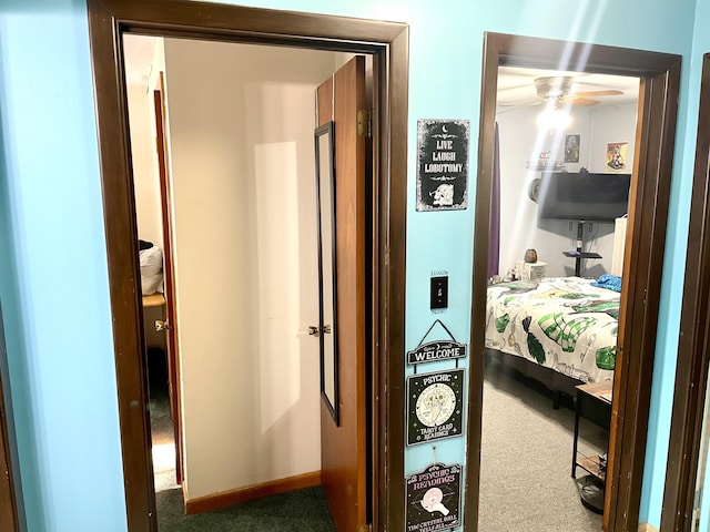 corridor with carpet floors