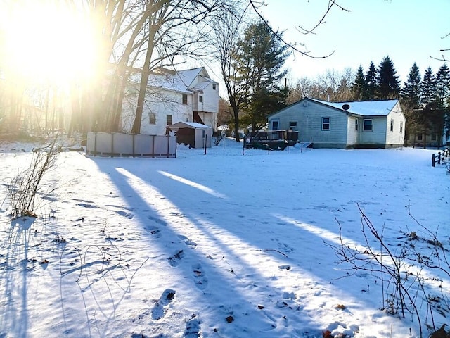 view of yard covered in snow