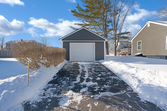 view of snow covered garage