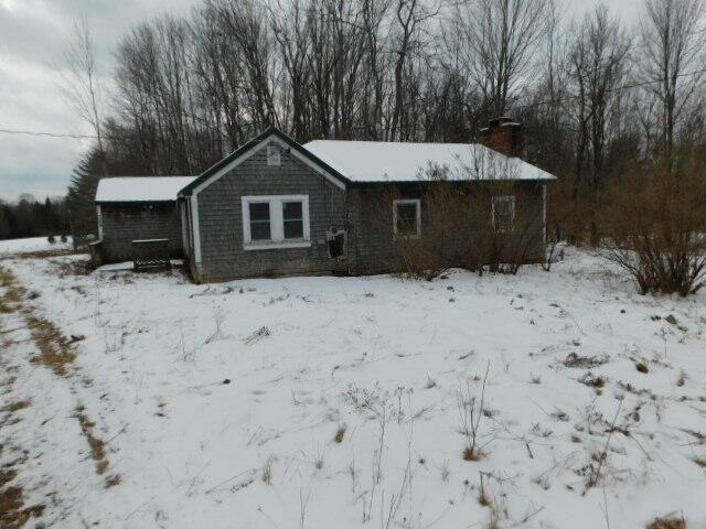 view of snow covered property