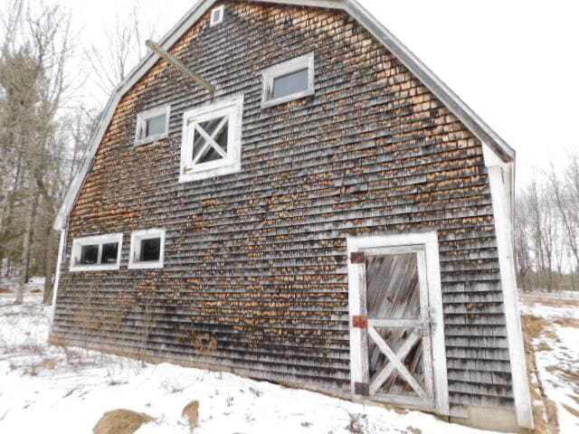 view of snow covered property