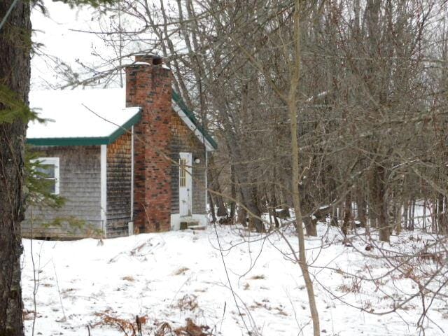 view of snow covered property