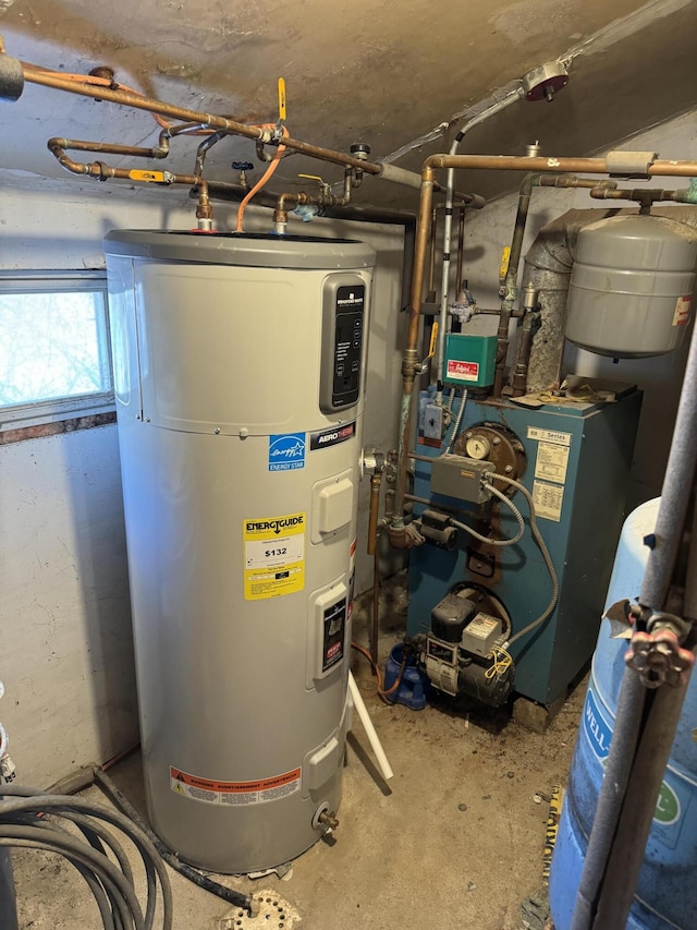 utility room featuring electric water heater