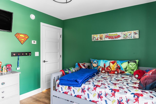 bedroom featuring light wood-type flooring