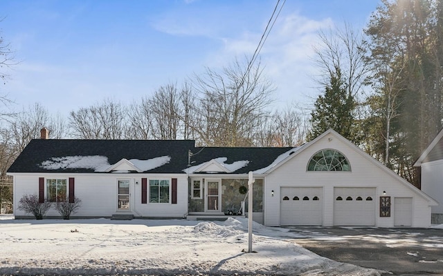 view of front of home with a garage