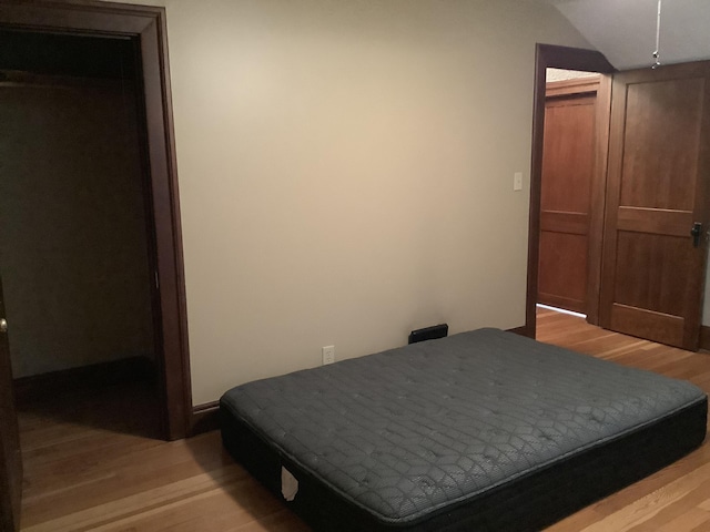 bedroom featuring light wood finished floors