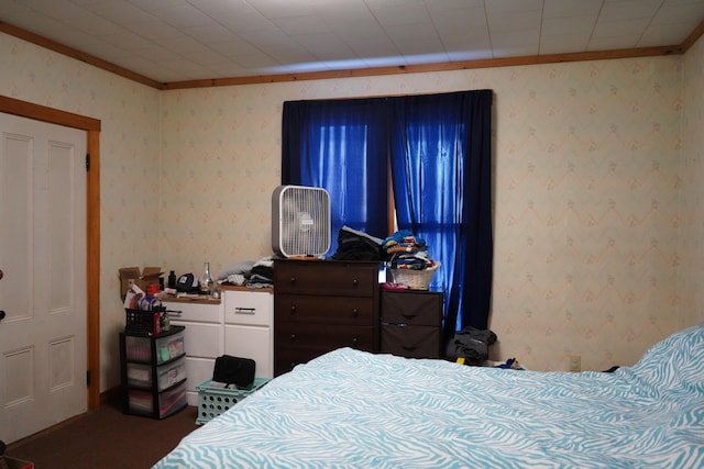 bedroom with ornamental molding